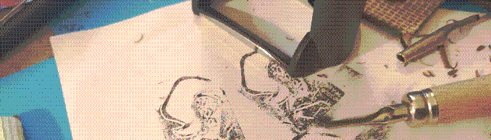 Cropped picture of few tools involed in linocut, also secret passage to technical page about arts